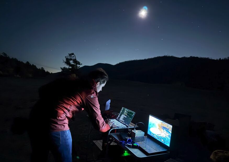 Operator in California desert communicating with Artemis II at the Moon