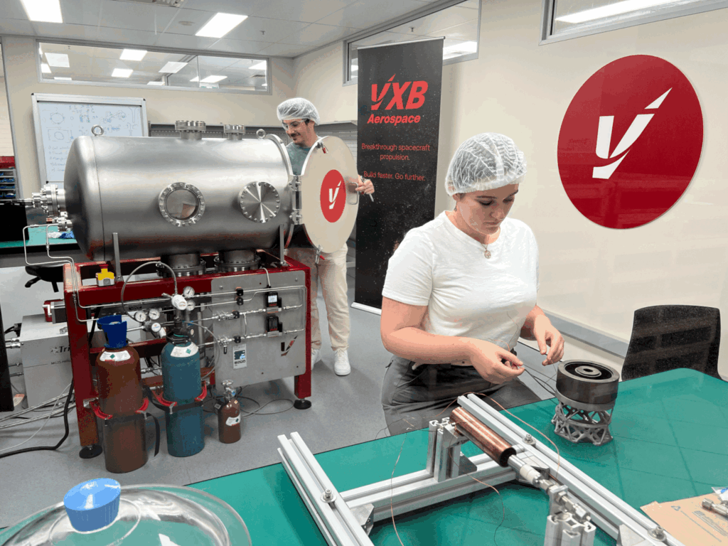 The VXB Aerospace Lab, testing, and simulation facility with active TVAC and structural testing being set up and executed.